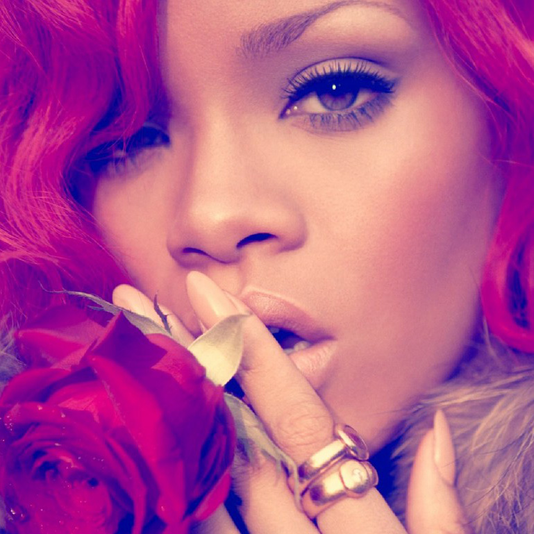 rihanna portrait with hot red hair style on the album