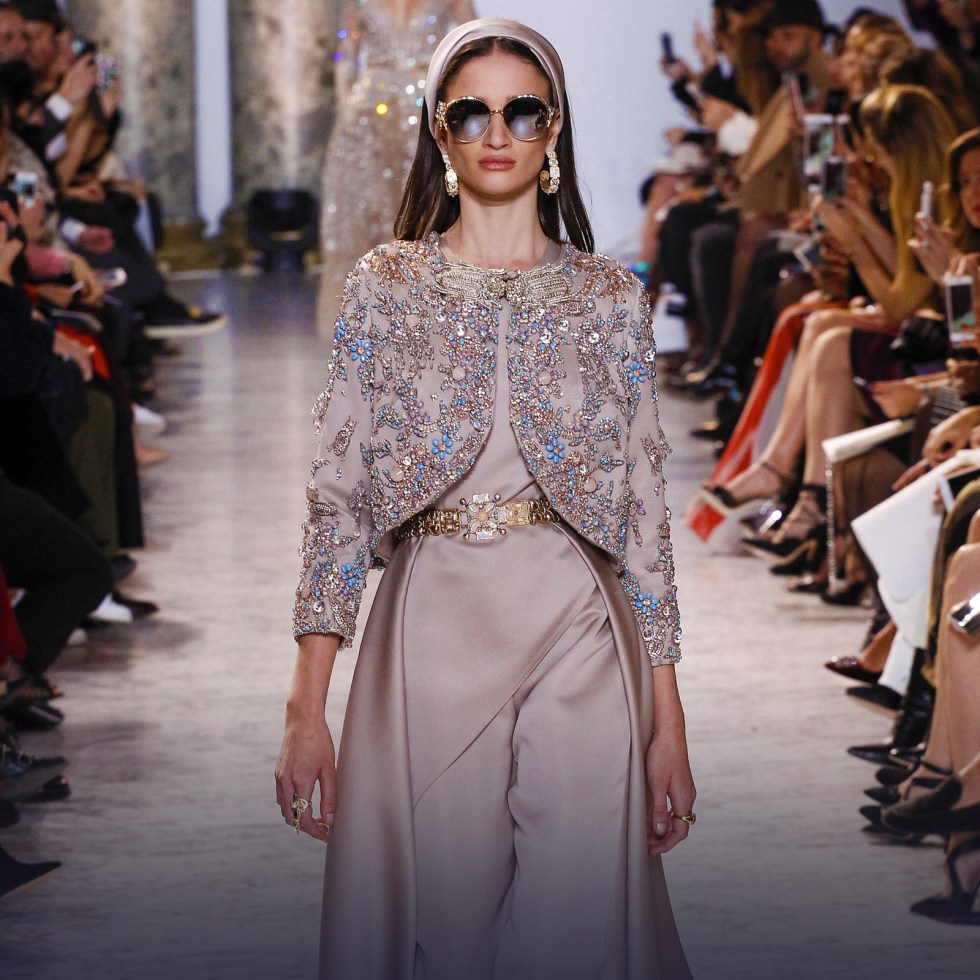 elie saab light grey silky pant suit worn by a model