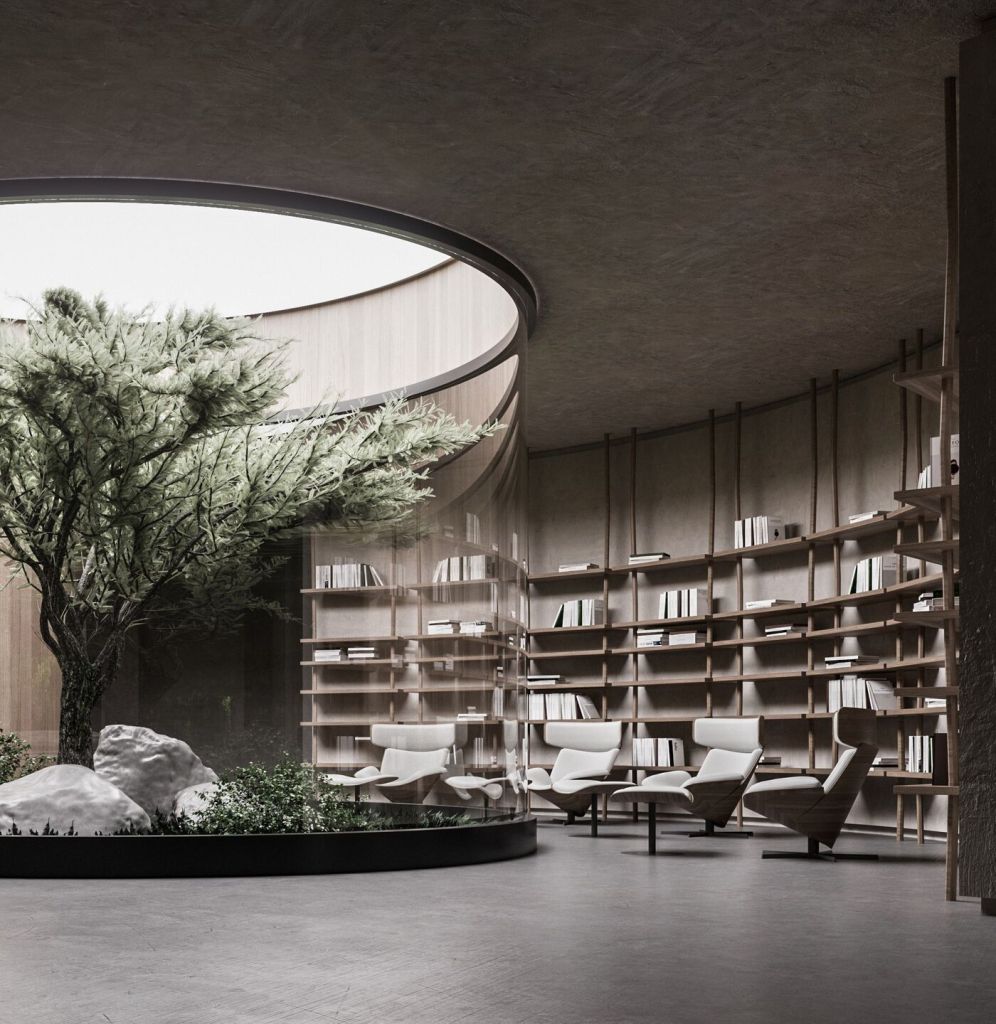 Interior view of an underground living room featuring a central tree surrounded by glass walls, wooden bookshelves, and modern seating.