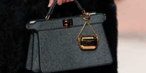 gold airpods case by fendi