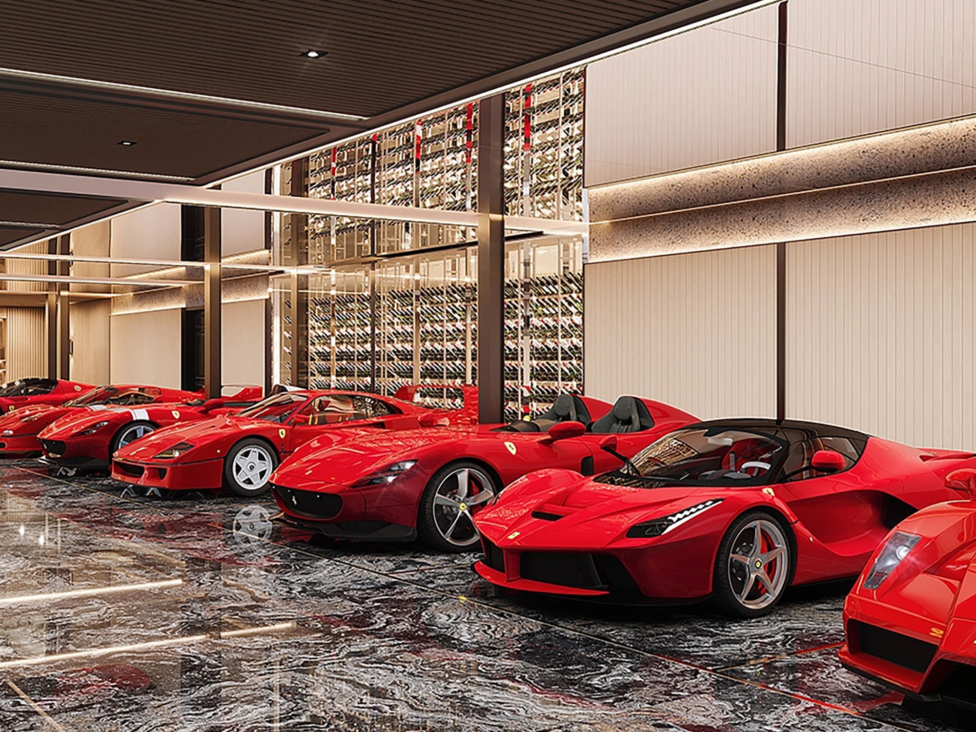 Fabulous private garage filled with red Ferrari supercars.