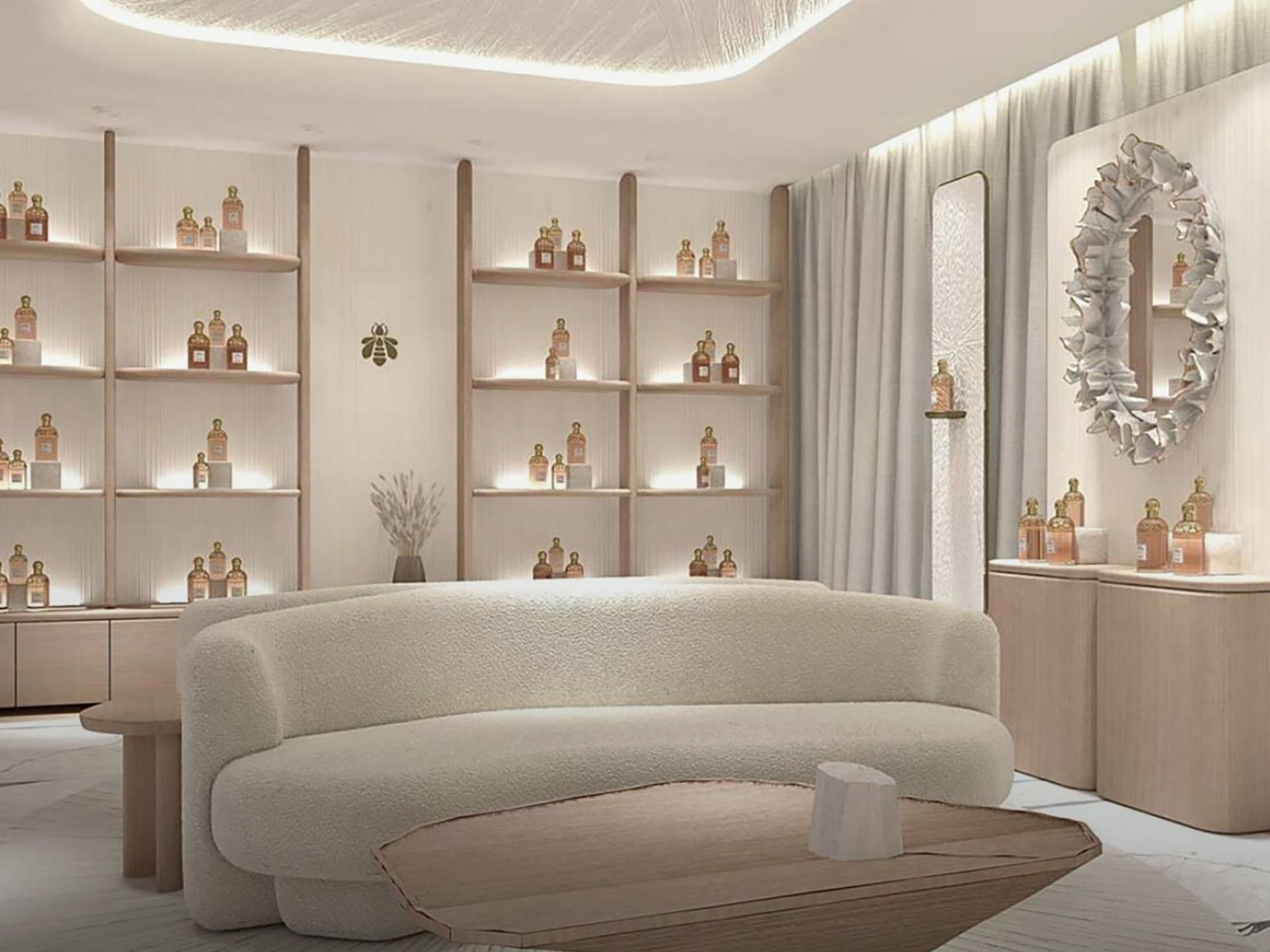 Elegant room with white furniture and shelves, showcasing the luxurious ambiance of the Guerlain spa Monaco perfume area.