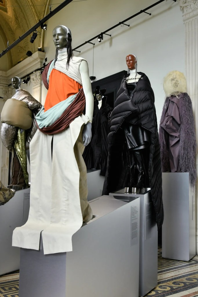 Rick Owens exhibition in Paris featuring cream, organise and purple garments