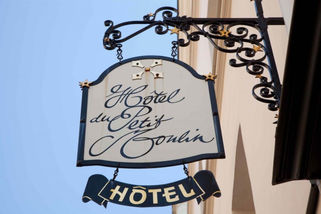 Hotel du Petit Moulin building sign