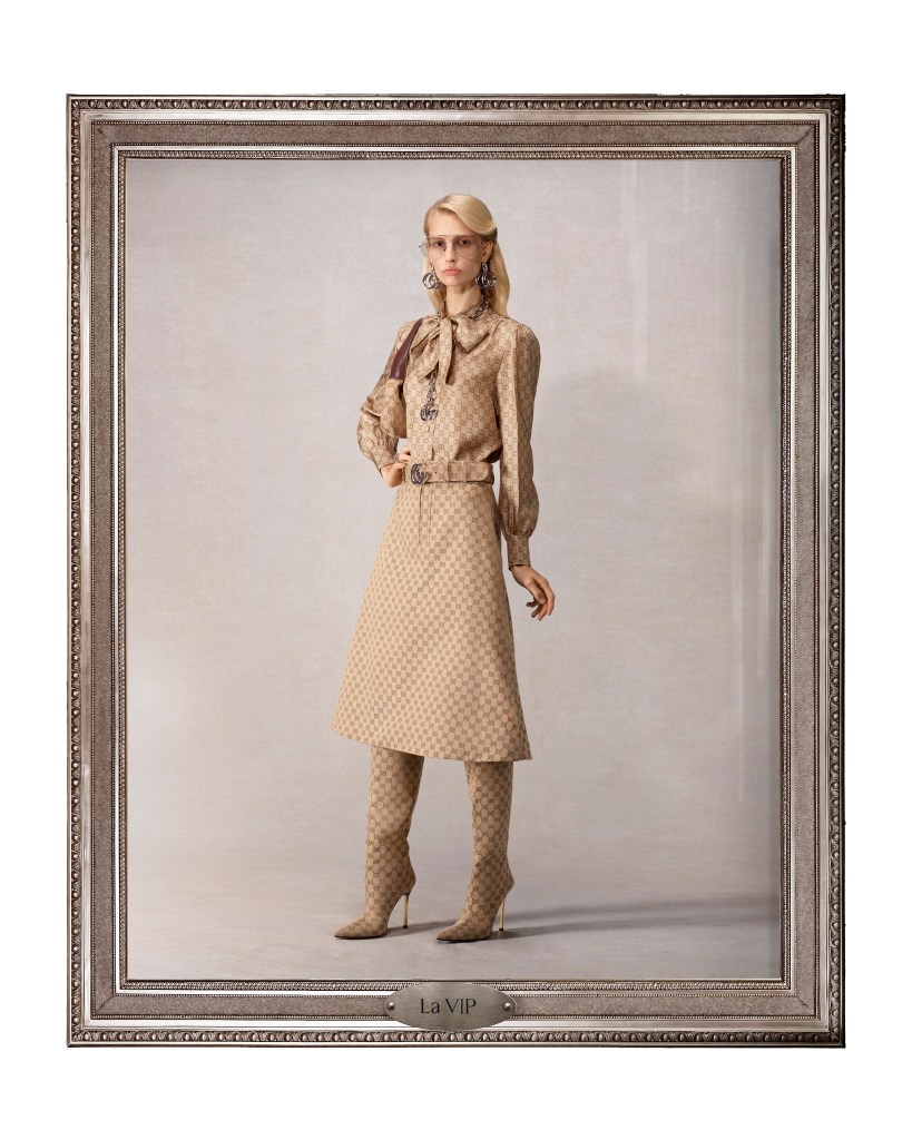 La VIP" blonde skinny model wears midi gucci monogram dress, sunglasses and boots with large earrings