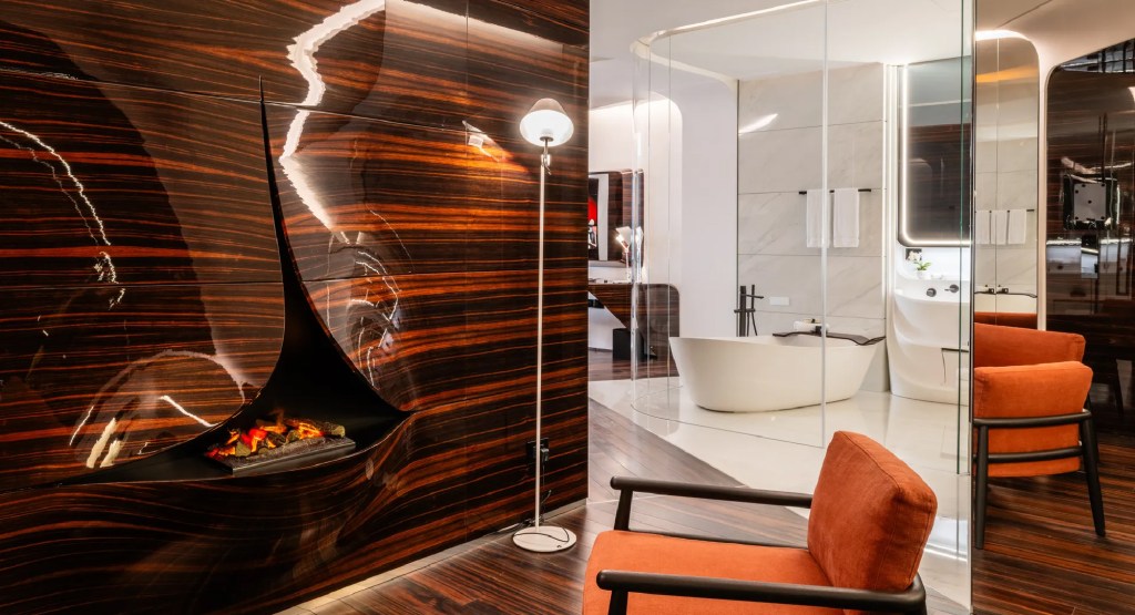 Fireplace built-in the design wall and bathroom with glass walls