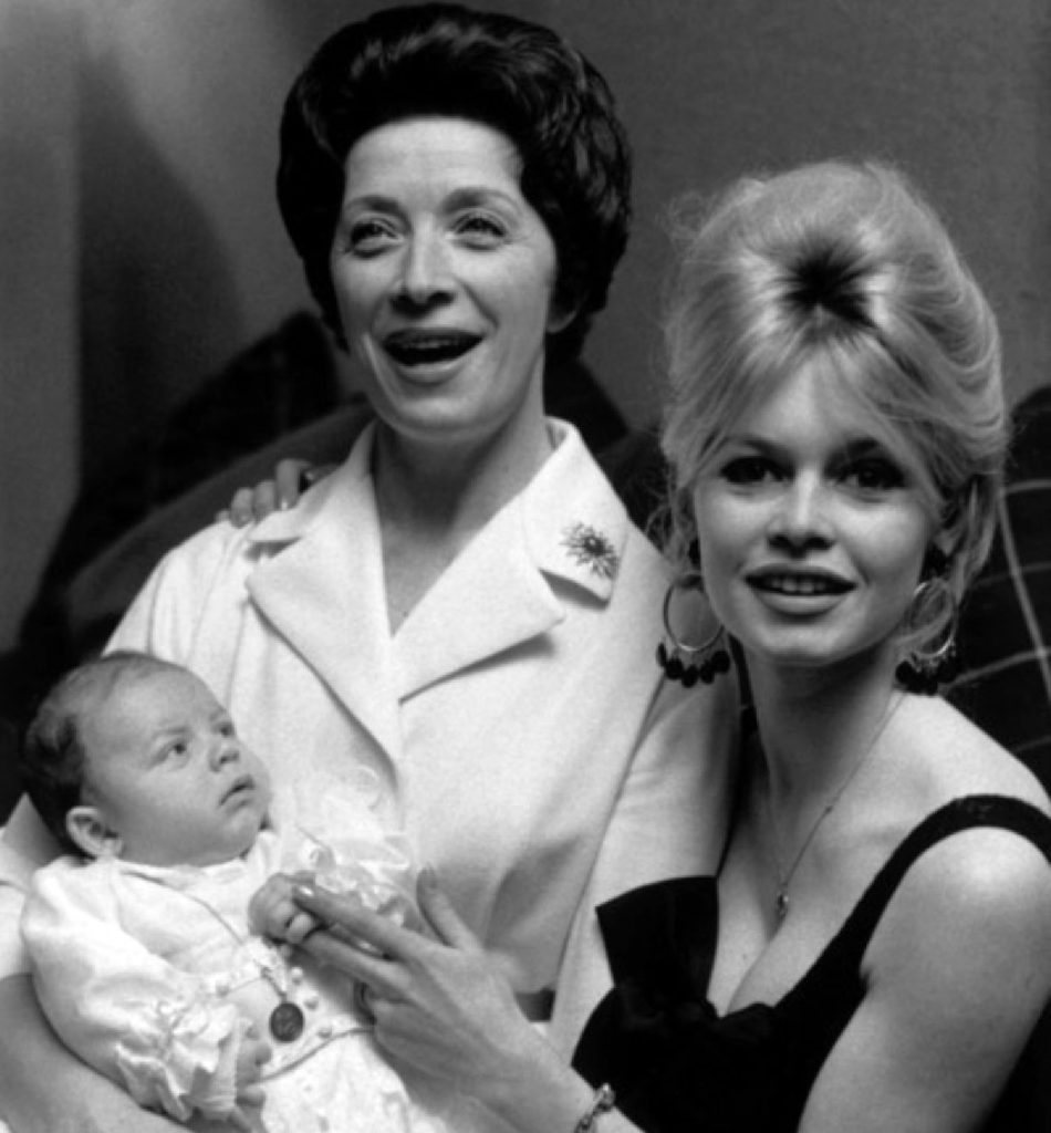 Brigitte Bardot with her mother Anne-Marie Mucel and her newly born son Nicolas-Jacques Charrier