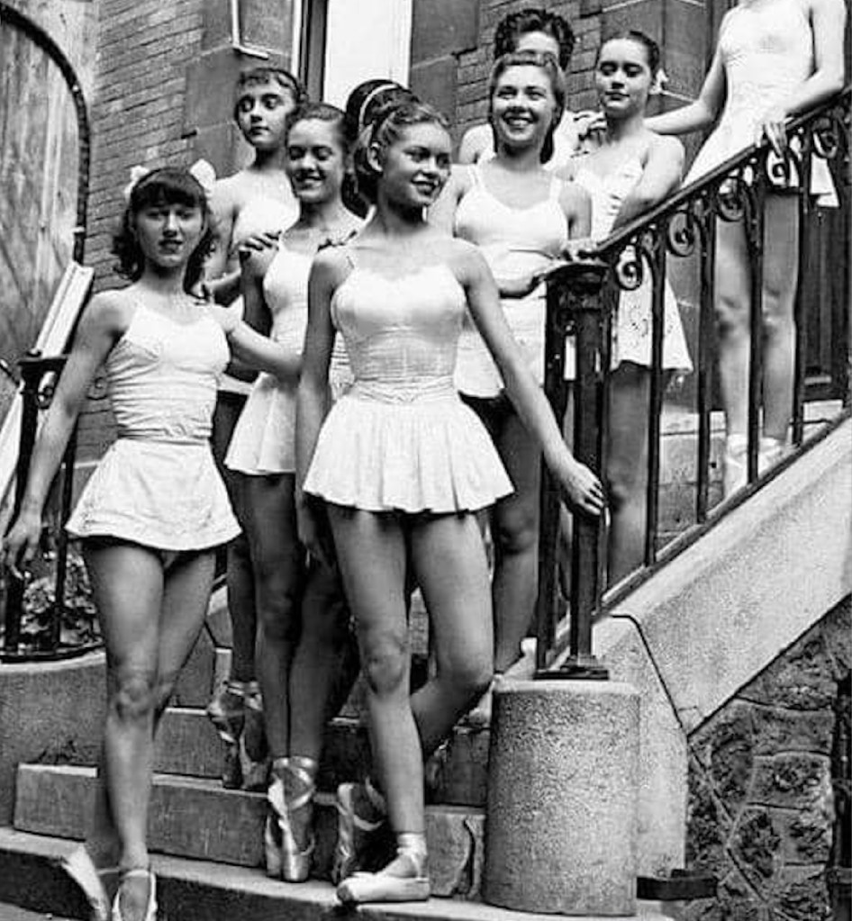 Young Brigitte Bardot at a ballet class with classmates in 1950.