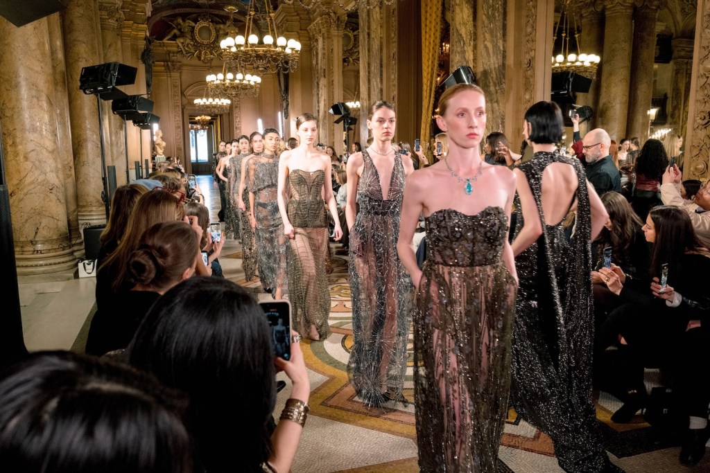 the muse fashion model on the runway at the opera garnier
