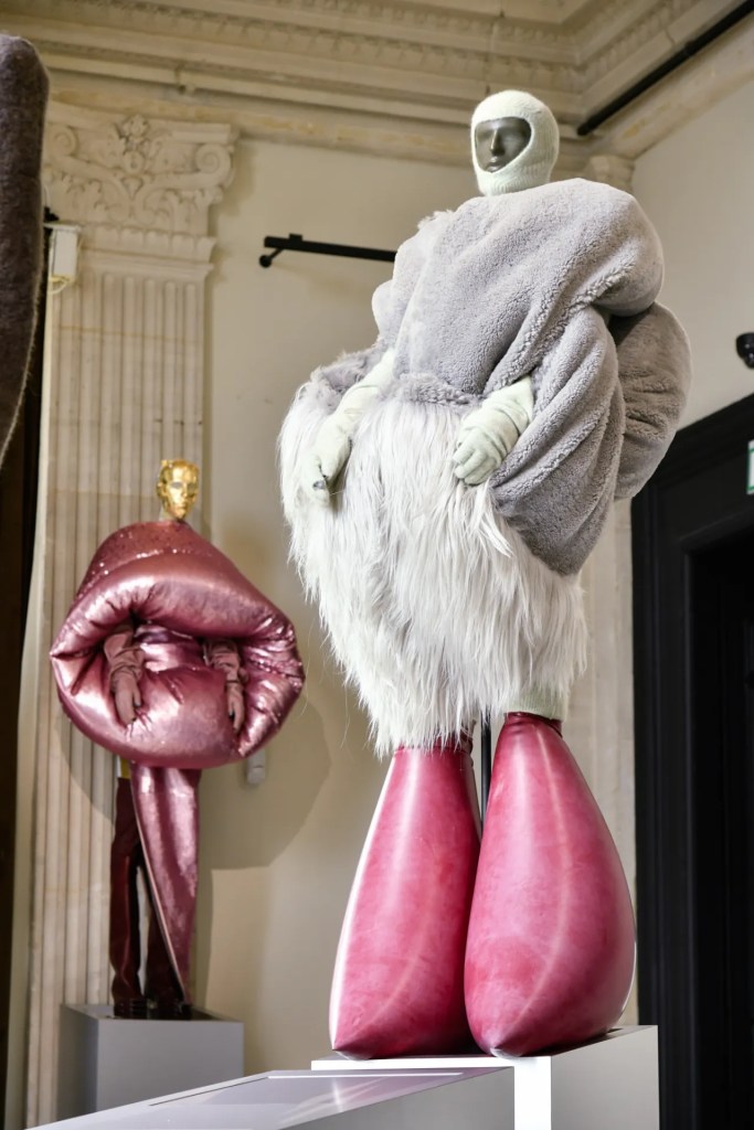 Rick Owens exhibition in Paris featuring fur jacket and pink inflated boots
