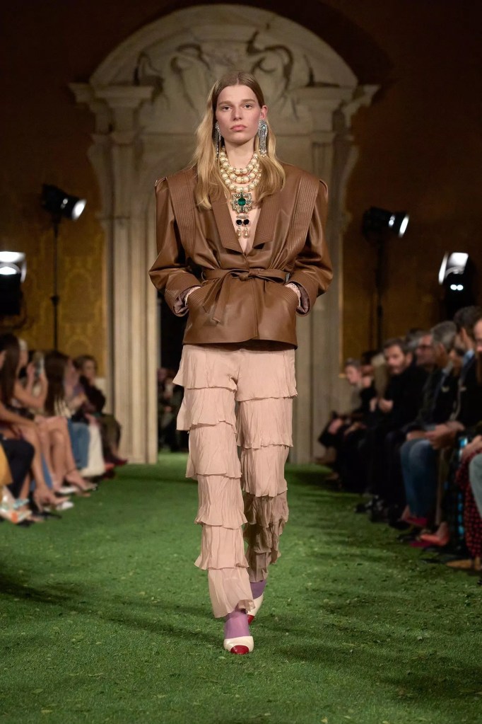 Valentino Fashion Show Fall 2026 model wears cqarzmel leather jacket