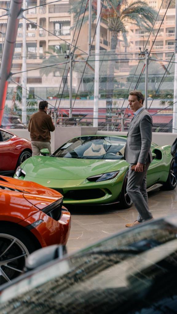 Monaco Supercars featuring green, red and orange Ferrari