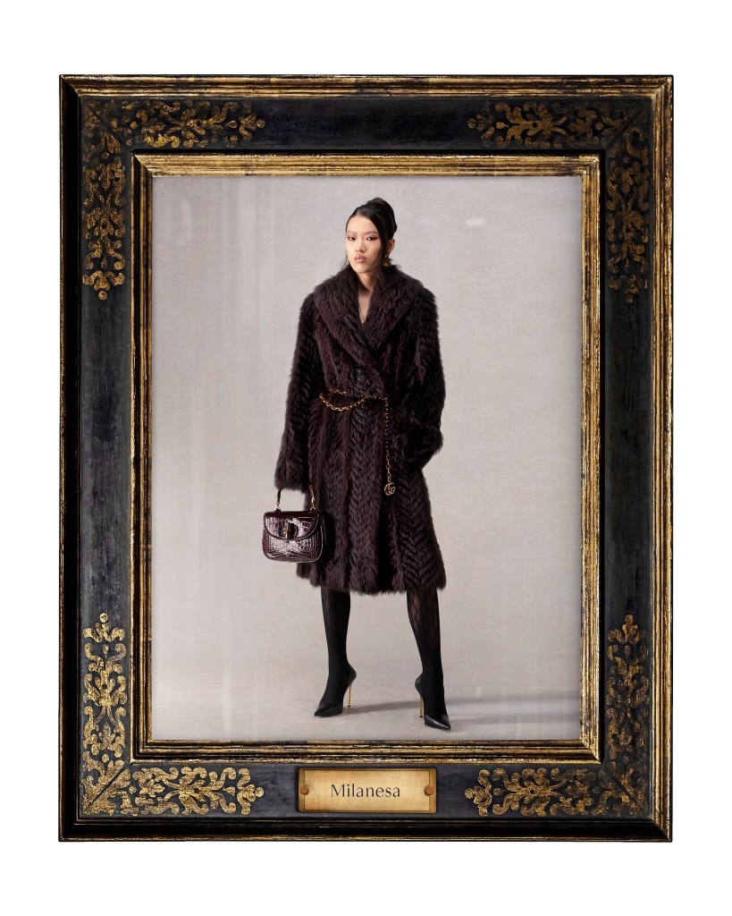 Gucci model wears long brown fur coat. by Demna