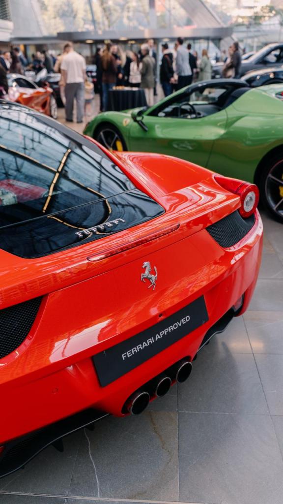 Monaco Supercars featuring green, red rare Ferrari