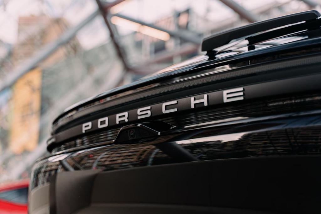 Monaco Supercars porsche logo on the back
