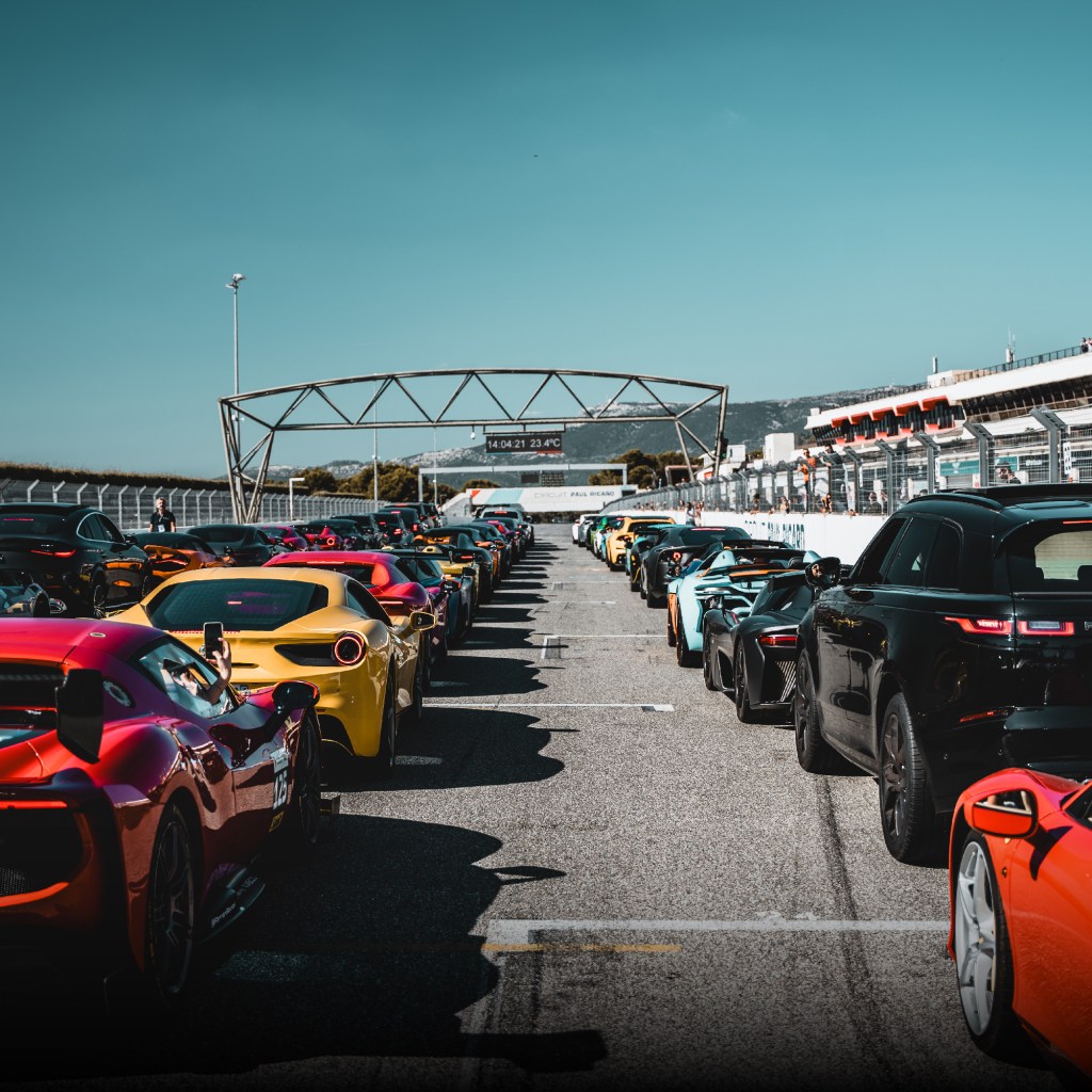 Colourful cars lined up at circuit