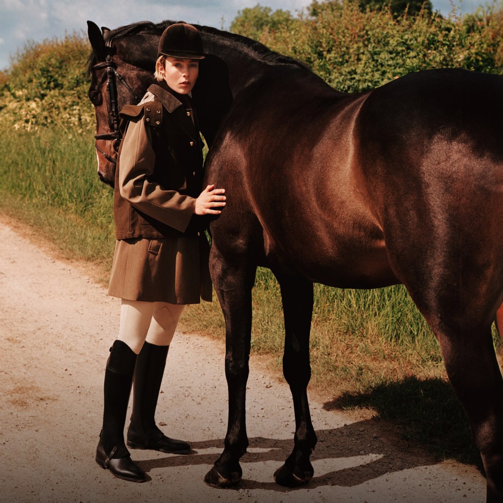 Loro Piana Highlands campaign featuring a woman with a brown horse.