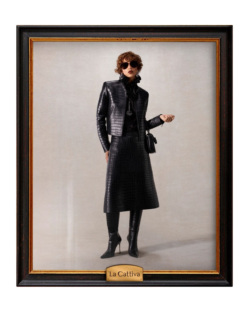 Gucci model wears black crocodile leather jacket and long skirt by Demna