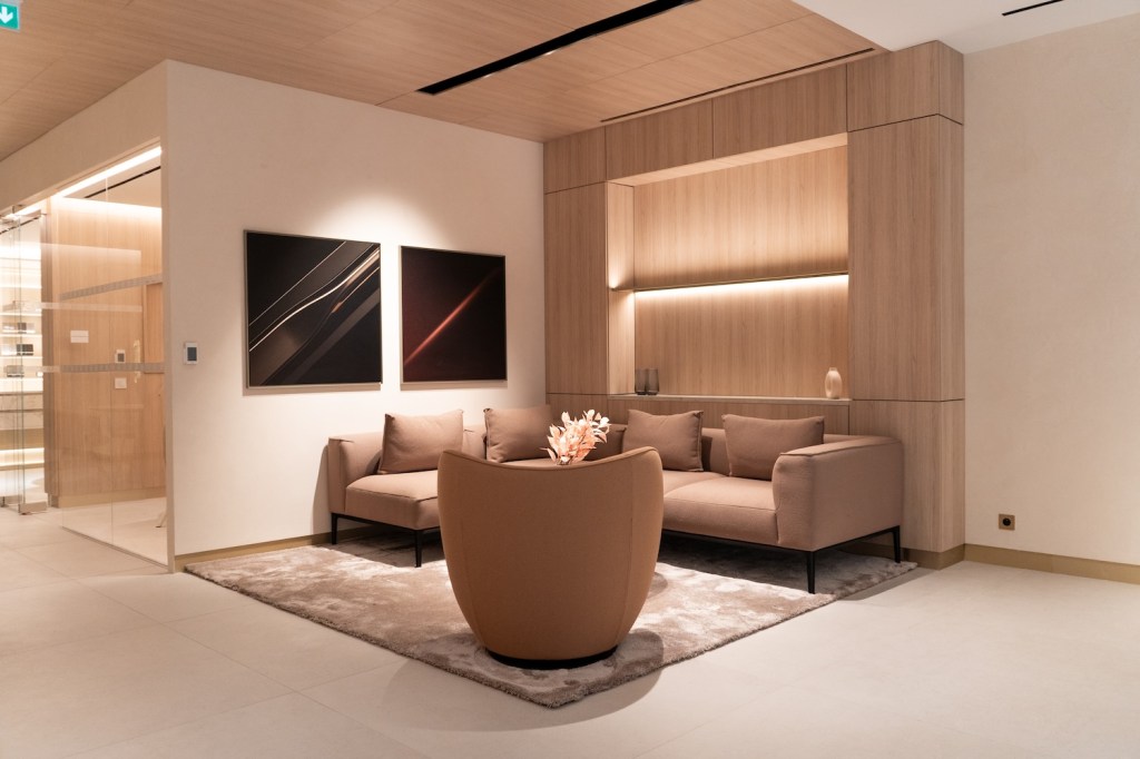 Jaguar Range Rover Showroom beige VIP lounge area interior design in Fontvielle in Monaco