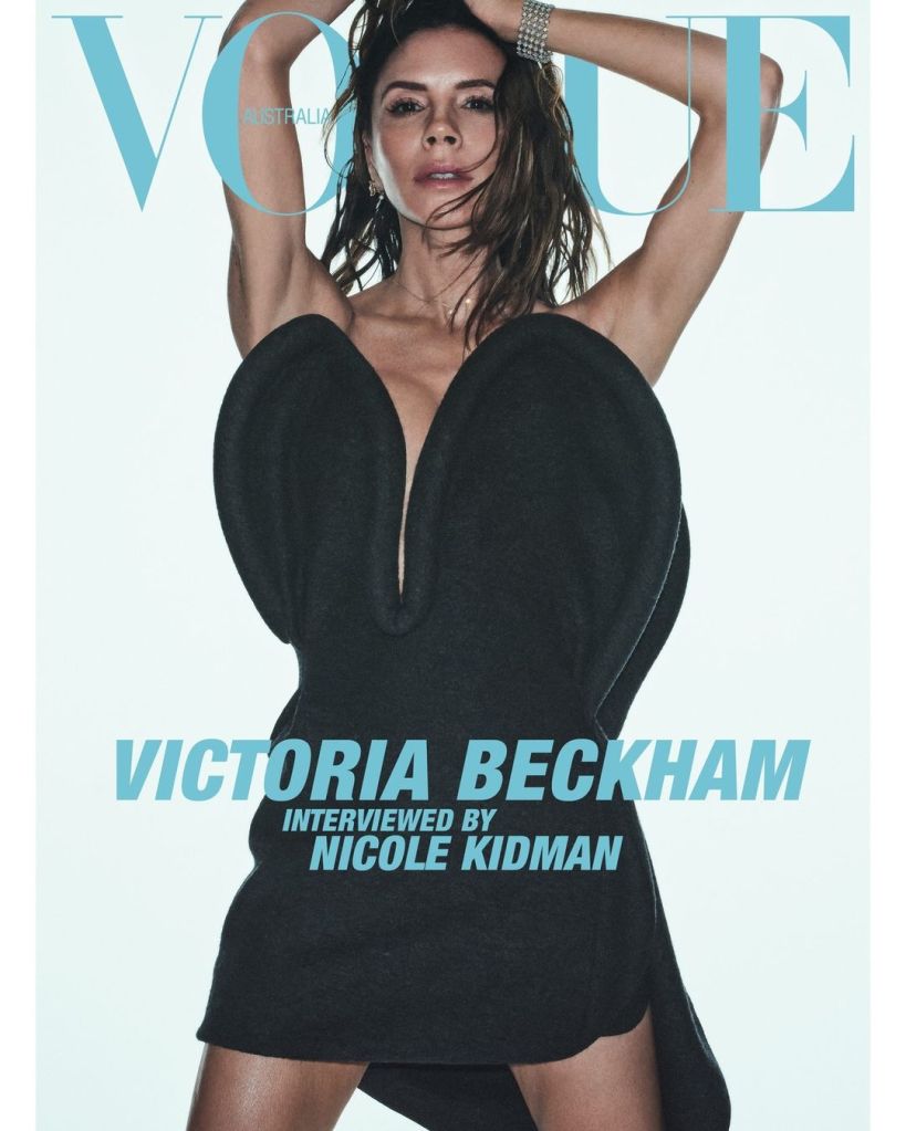 victoria beckham wearing a mini black dress on the cover of australian vogue