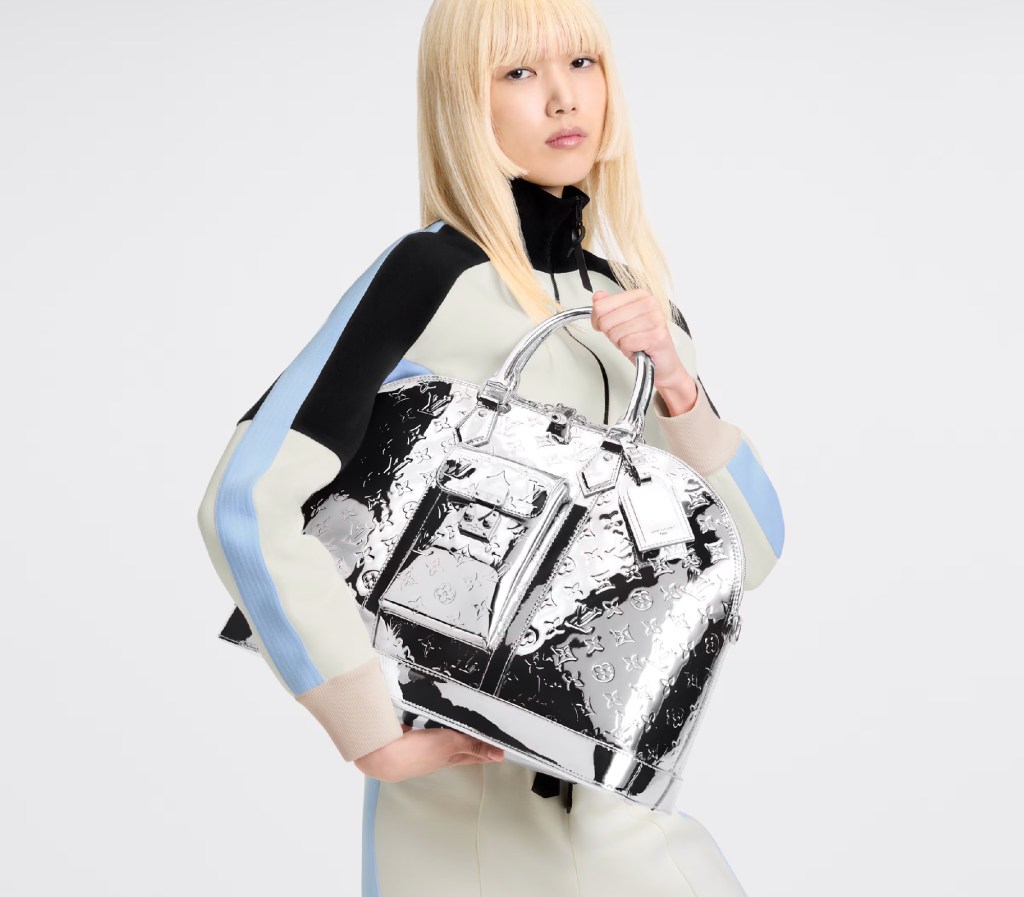 LV monogram silver bag in the hands of an asian blonde female model