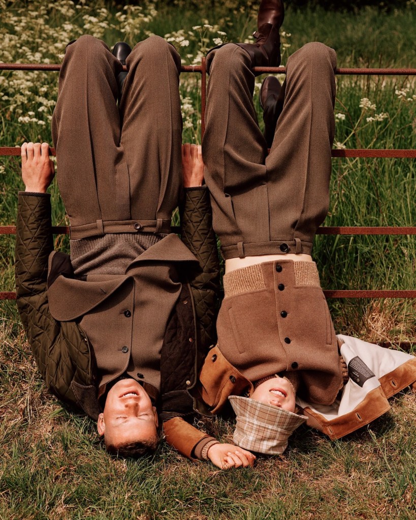Man and woman hanging upside down laughing and having fun.
